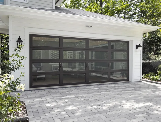 Charlotte Garage Door Repair design specialist presenting custom garage door options to Charlotte homeowner