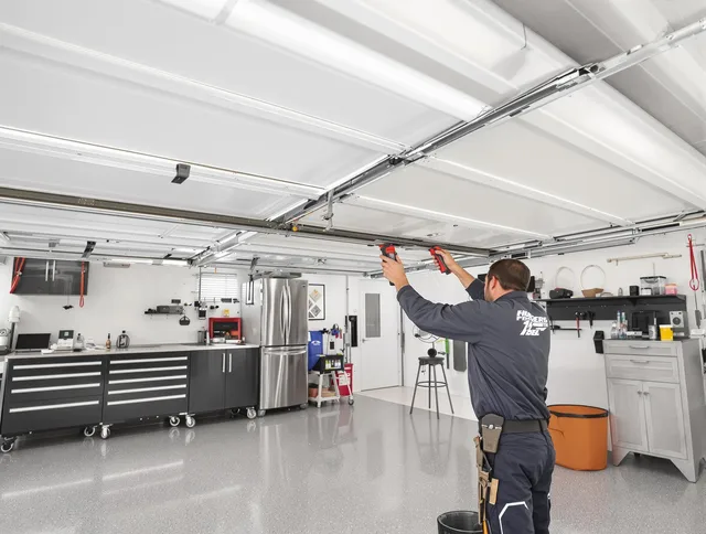 Overhead garage door repair service by Charlotte Garage Door Repair in Charlotte