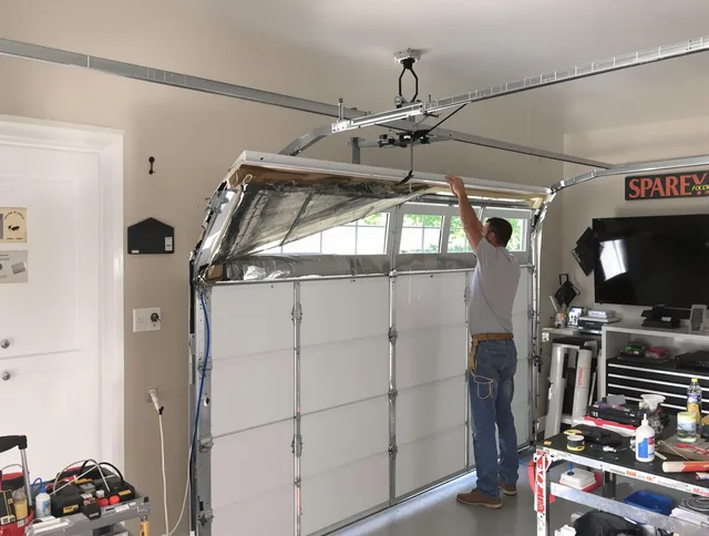 Garage door section replacement by Charlotte Garage Door Repair in Charlotte